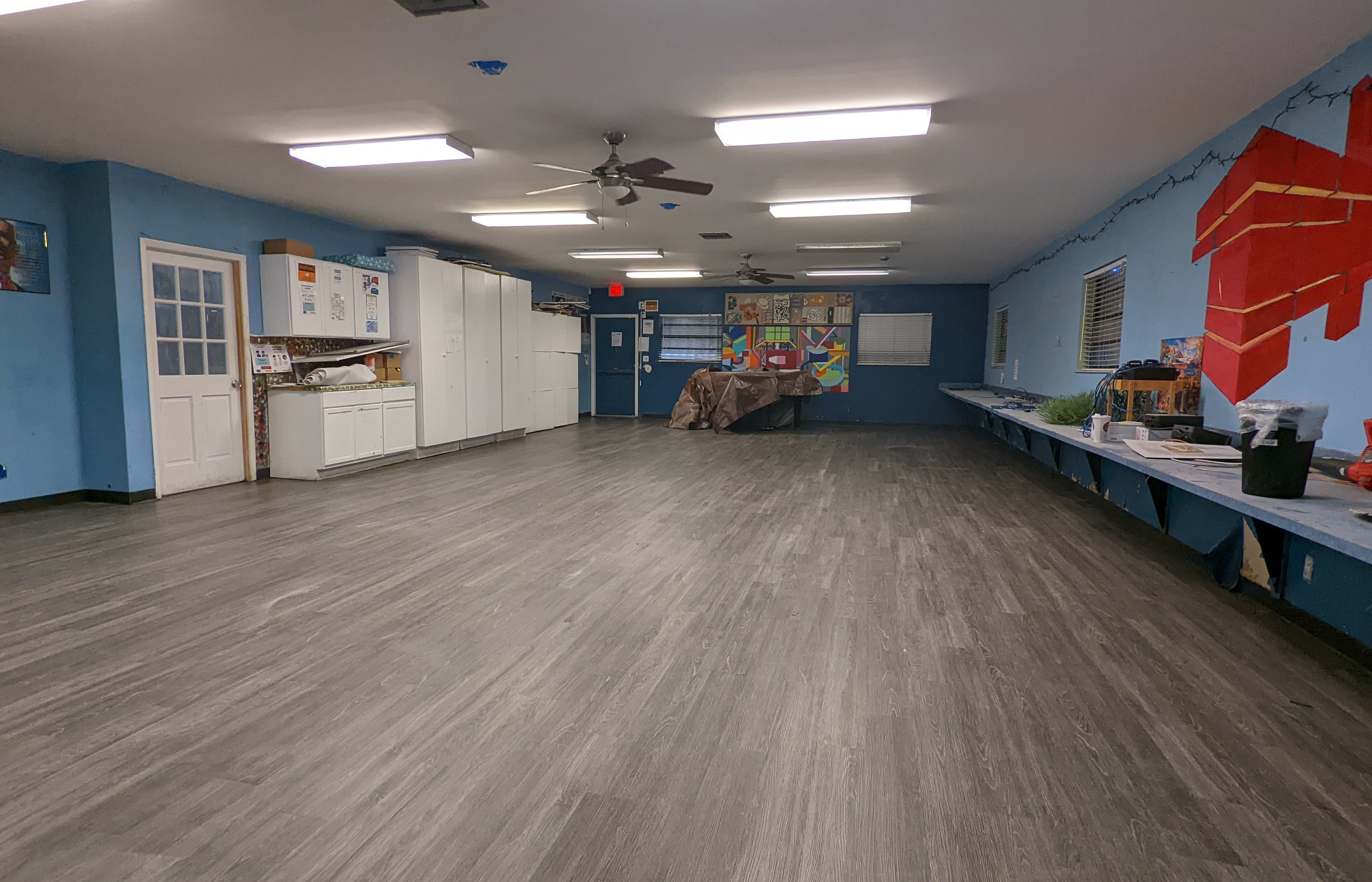 After photo of Milagro Center's updated Teen Center featuring new floors and ceilings.