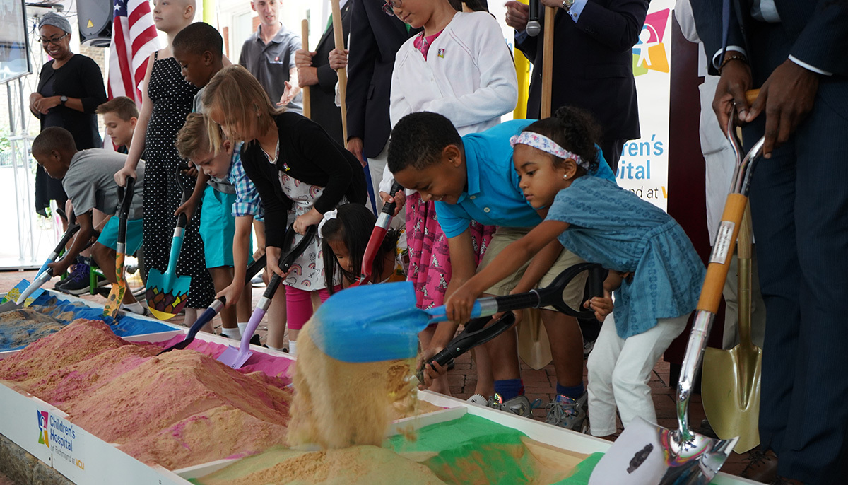 Children participate in the groundbreaking of the new VCU children's hospital.